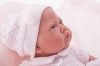 Antonio csecsemő baba világos rózsaszín ruhában, takaróval, 42 cm-es
